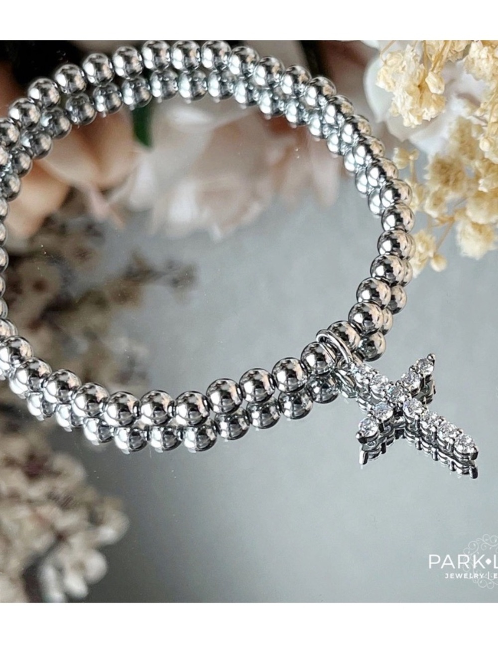 Park Lane “EDEN” Crystal Cross Silver Bead Stretch Bracelet